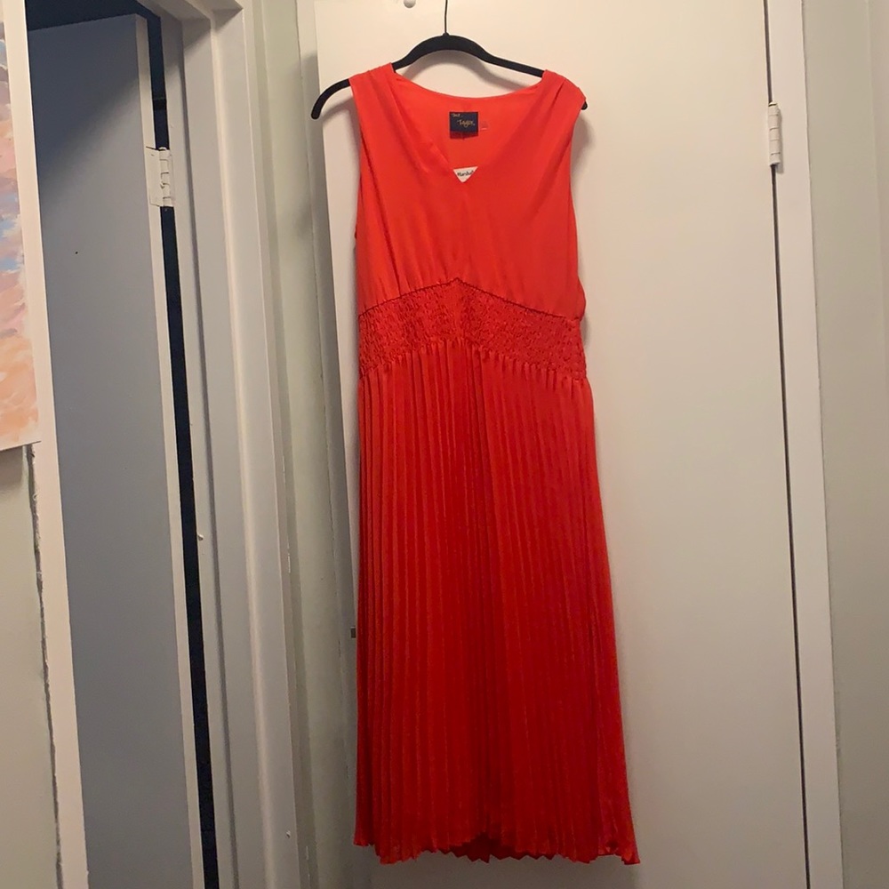 Bright coral dress with pleated skirt